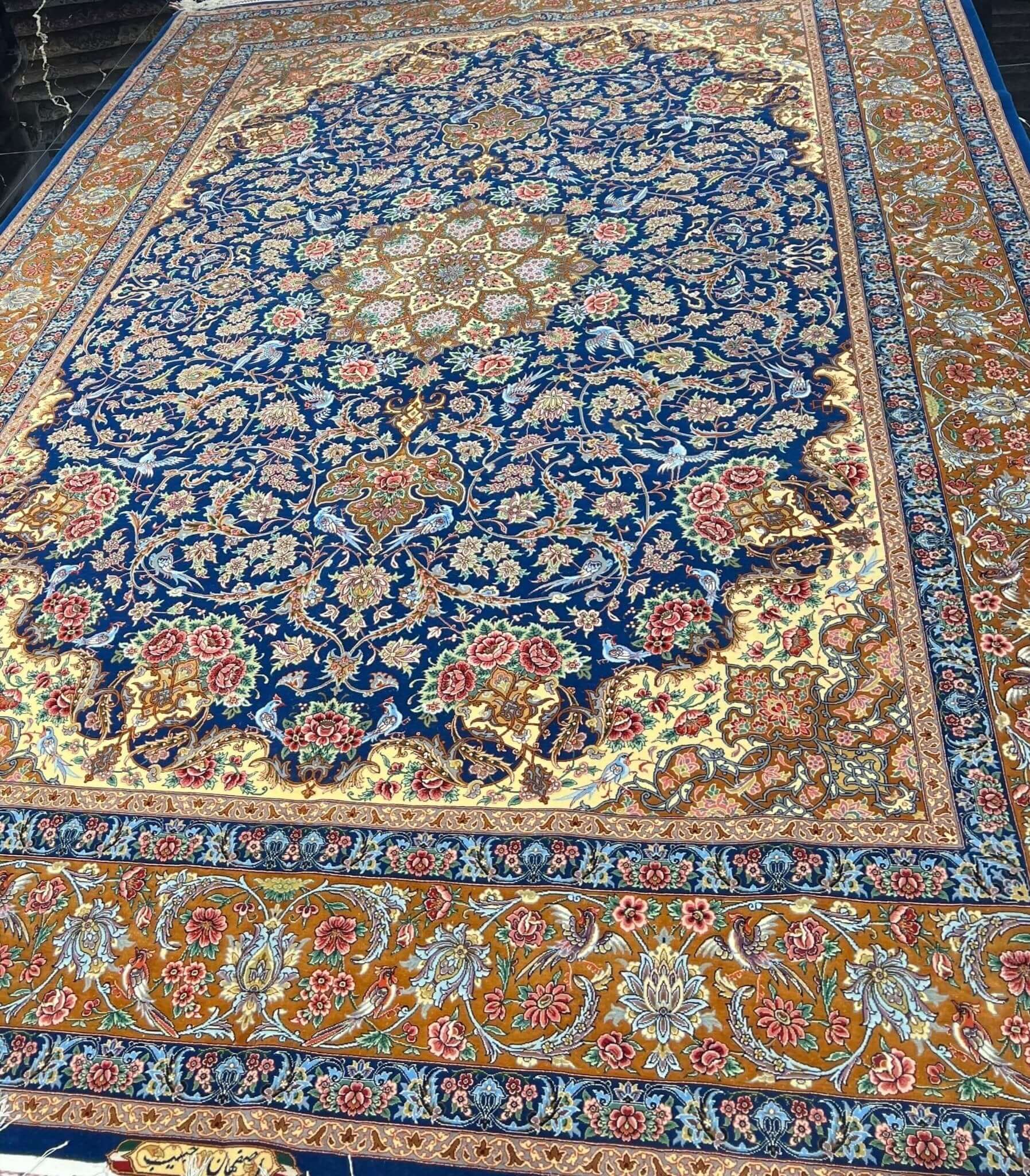 "Unique blue Persian wool rug, designed by weaver Habib, blending silk and wool in an intricate pattern."